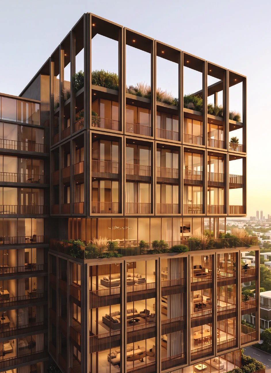 The crowning storeys of The Archive: a grid of brass-framed bays, standing empty like shelving