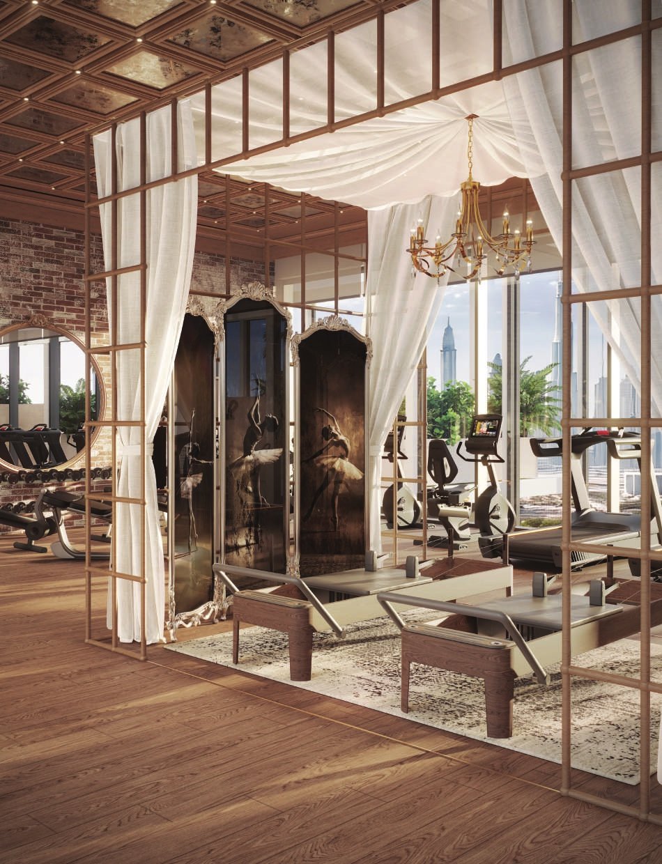 The gym beneath a lattice of gold and glass
