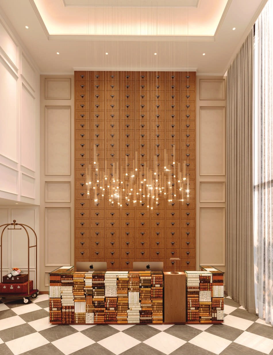 The arrival hall, chandelier above a checkerboard floor