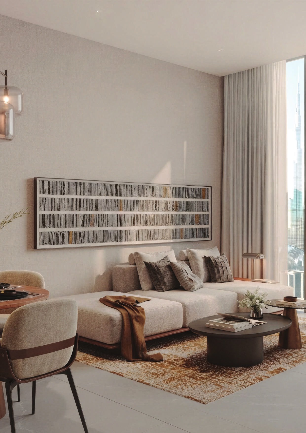 The living room, soft neutral furniture beneath a woven art panel